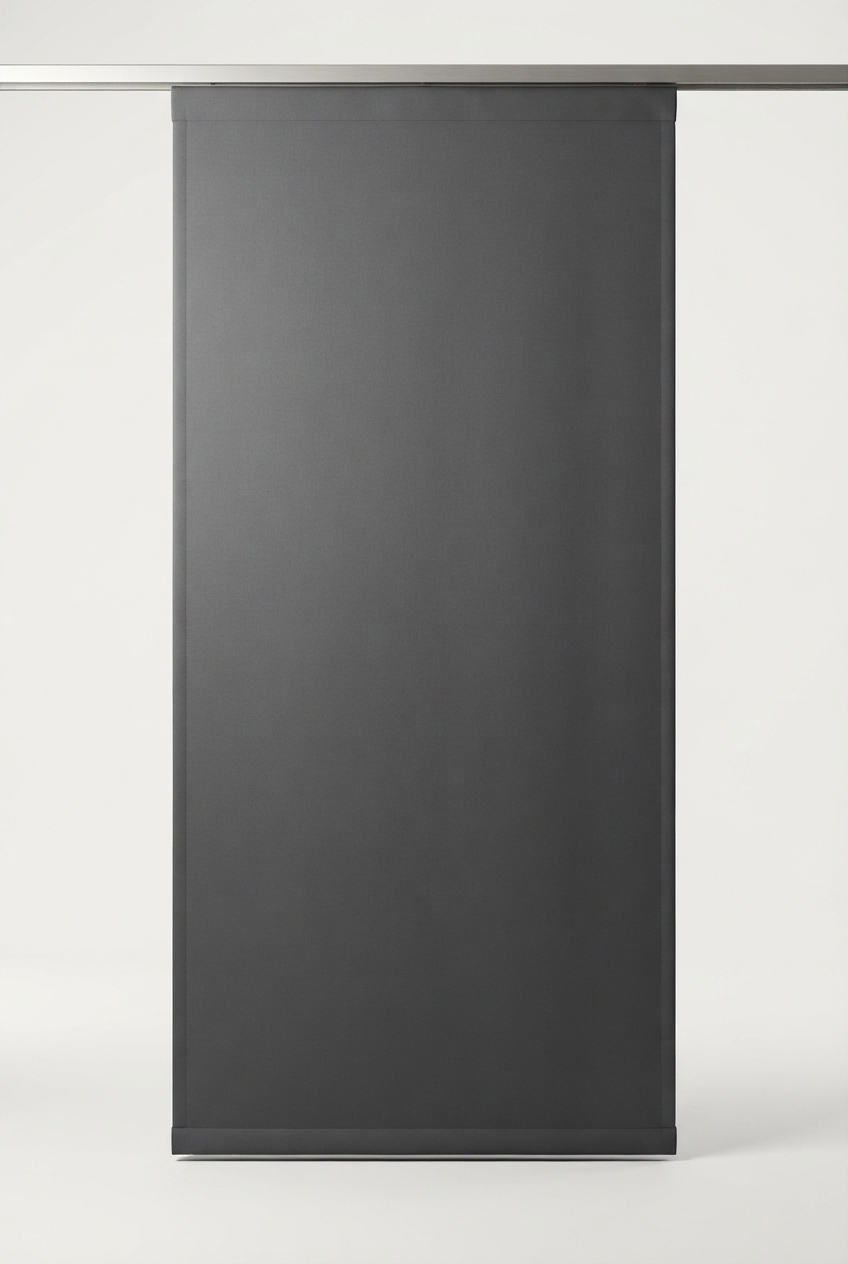 Dark gray blackout curtain panel with grommet top