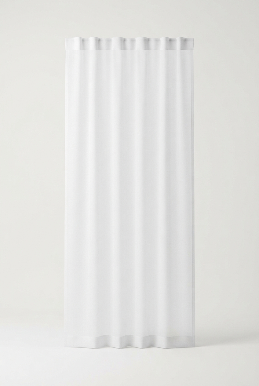 White sheer voile curtain panel hanging softly